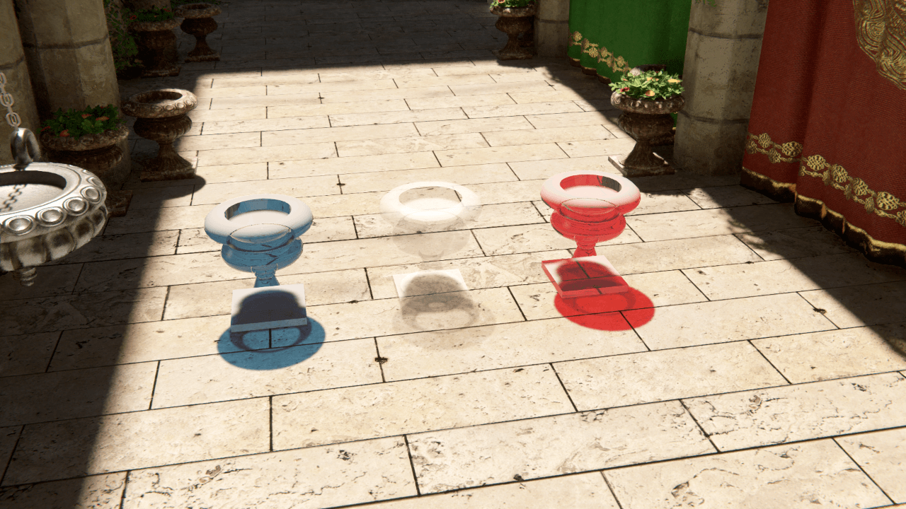 Three different colored GameObjects with ray traced Directional Light colored shadows of the corresponding colors.