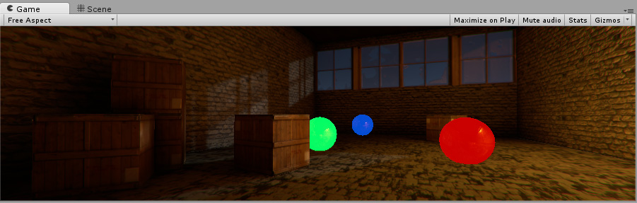 使用发光材质的红色、绿色和蓝色球体。即使处于黑暗场景中，这些球体似乎也是从内部光源照亮的。